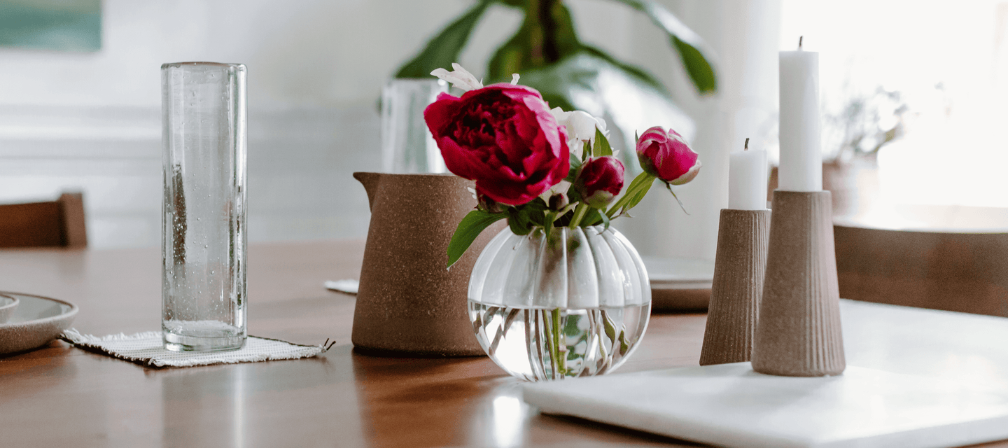 Vase with flowers on a tabletop